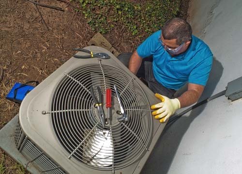An Air Conditioning Tune-Up Technician