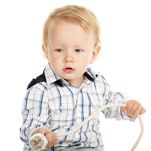 Boy with electrical cord photo
