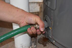 Demonstration on how to flush a water heater